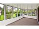 Bright sunroom with views of the backyard and multiple windows allowing natural light to pour in at 8906 N County Road 1050 E, Brownsburg, IN 46112