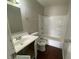 This bathroom features a single sink vanity, toilet, and shower-tub combo at 9048 E 36Th St, Indianapolis, IN 46235