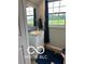 Cozy bathroom with a vanity, mirror, tile floor and a large window with a view of the outdoors at 911 Centennial Rd, Martinsville, IN 46151