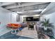 Finished basement with a cozy seating area, TV, and comfortable furnishings at 914 Kessler Blvd E Dr, Indianapolis, IN 46220