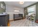 Cozy Bedroom with gray crib, patterned wallpaper, and ample natural light at 914 Kessler Blvd E Dr, Indianapolis, IN 46220