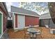 Relaxing backyard with a patio set and privacy, ideal for outdoor enjoyment and entertaining guests at 946 Stillwell St, Indianapolis, IN 46202