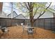 Charming backyard with a patio, chairs, and a table, perfect for outdoor relaxation and entertaining at 946 Stillwell St, Indianapolis, IN 46202