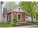 Inviting home exterior with lush greenery and a well-kept lawn, offering great curb appeal at 946 Stillwell St, Indianapolis, IN 46202