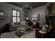 Cozy living room with a gray color scheme featuring stylish decor, comfortable seating, and shuttered windows at 946 Stillwell St, Indianapolis, IN 46202