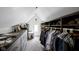 Spacious walk-in closet providing ample storage with custom shelving and drawers, perfect for organization at 946 Stillwell St, Indianapolis, IN 46202
