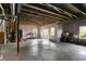 Large unfinished basement with exposed ceiling and framing, showcasing potential for customization at 10294 Pigato Dr, Zionsville, IN 46077