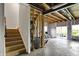 Unfinished basement with exposed ceiling and framing, ready for customization at 10294 Pigato Dr, Zionsville, IN 46077