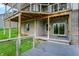Multi-level deck exterior with a view of the brick house and landscaped yard at 10294 Pigato Dr, Zionsville, IN 46077