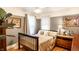 Cozy bedroom with hardwood floors and neutral color scheme for a serene and inviting space at 1030 N Butler Ave, Indianapolis, IN 46219