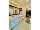 Bathroom with a double sink vanity and a walk-in closet at 1119 E Main Cross St, Edinburgh, IN 46124