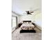 Bedroom with neutral carpet, ceiling fan and two windows for natural light at 1119 E Main Cross St, Edinburgh, IN 46124
