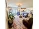 This living room has a decorative rug, plenty of natural light, and comfortable seating at 1119 E Main Cross St, Edinburgh, IN 46124
