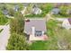 Aerial view of home featuring a patio, landscaped yard, and mature trees in a quiet neighborhood at 11205 Echo Ridge Ln, Indianapolis, IN 46236