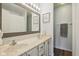 Bright bathroom features double sink vanity and large mirror at 11205 Echo Ridge Ln, Indianapolis, IN 46236