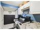 Well-organized laundry room with modern washer and dryer, cabinetry, and stylish decor at 11205 Echo Ridge Ln, Indianapolis, IN 46236