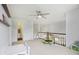 Upstairs playroom space with a trampoline and small table and chairs at 11205 Echo Ridge Ln, Indianapolis, IN 46236