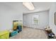 Spacious bedroom with neutral walls, carpeted floor, and natural light at 11469 Burkwood Dr, Carmel, IN 46033