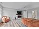 Spacious bedroom with natural light, hardwood flooring, and comfortable furnishings at 11469 Burkwood Dr, Carmel, IN 46033