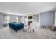 Cozy living room with fireplace, built-in shelves, plush seating, and natural light at 11469 Burkwood Dr, Carmel, IN 46033