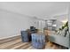 Open living space featuring modern decor, hardwood floors, and an open-concept kitchen at 11469 Burkwood Dr, Carmel, IN 46033