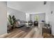 Inviting living room with contemporary furniture, wood floors, and bright lighting at 11469 Burkwood Dr, Carmel, IN 46033
