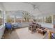 Sunroom with lots of windows, carpeted floors, and comfortable seating at 11469 Burkwood Dr, Carmel, IN 46033