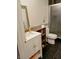 Bathroom with modern fixtures, tiled floors, and glass door shower at 11651 Congressional Ln, Indianapolis, IN 46235