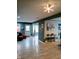 Bright living room featuring modern lighting, stylish decor, and durable laminate floors at 11651 Congressional Ln, Indianapolis, IN 46235