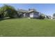House is in the background with nice lawn in foreground at 11697 Whisper Bay Ct, Carmel, IN 46033