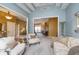 Spacious living area showcasing hardwood floors, neutral walls, and open layout at 11697 Whisper Bay Ct, Carmel, IN 46033