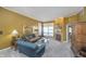 Comfortable living room with fireplace, light-colored carpet, and wooden accents at 11697 Whisper Bay Ct, Carmel, IN 46033