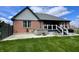 Backyard with hot tub, deck, and privacy fence at 12043 N Berling Dr, Mooresville, IN 46158