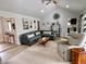 Inviting living room with vaulted ceilings, recessed lighting, and neutral decor, creating a cozy and stylish space at 12043 N Berling Dr, Mooresville, IN 46158