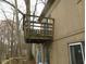 Exterior view of a balcony on the side of the house with the surrounding trees at 121 Lake Hart, Mooresville, IN 46158