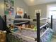 Whimsical bedroom featuring colorful posters and a wrestling ring themed bed at 121 Lake Hart, Mooresville, IN 46158