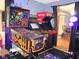 Recreation area with multiple stand-up video games on a unique neon floor mat at 121 Lake Hart, Mooresville, IN 46158