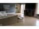 Open-concept living room with hardwood floors and sliding glass door to the backyard at 121 Lake Hart, Mooresville, IN 46158