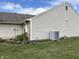 Picture of a home exterior showing an air conditioning unit and a neat row of flower beds in a grassy yard at 1316 Long Shore Dr, Indianapolis, IN 46217