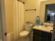 Cozy bathroom features a shower-tub combination and traditional fixtures at 1316 Long Shore Dr, Indianapolis, IN 46217
