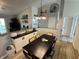 Inviting dining room featuring an elegant table, updated lighting, and an open design for seamless entertaining at 1316 Long Shore Dr, Indianapolis, IN 46217