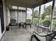 Screened porch with outdoor seating, great for relaxation at 1316 Long Shore Dr, Indianapolis, IN 46217