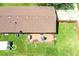An aerial view of a fenced-in backyard with a wooden deck and seating area perfect for entertaining at 1355 Ash Ct, Martinsville, IN 46151