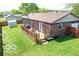 A large backyard and deck with furniture are perfect for outdoor entertainment at 1355 Ash Ct, Martinsville, IN 46151
