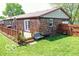 The backyard features an inviting deck, perfect for relaxing and enjoying outdoor activities at 1355 Ash Ct, Martinsville, IN 46151