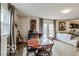 Inviting dining area with hardwood floors, blending seamlessly with the open floor plan at 1355 Ash Ct, Martinsville, IN 46151