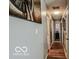 Hallway featuring wood floors and neutral gray walls at 1355 Ash Ct, Martinsville, IN 46151