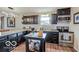 Inviting kitchen featuring dark cabinetry, stainless steel appliances and ample countertop space at 1355 Ash Ct, Martinsville, IN 46151