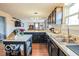 Bright kitchen with stainless steel sink and ample counter space at 1355 Ash Ct, Martinsville, IN 46151