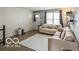 Comfortable living room featuring a couch, hardwood floors and a bright window at 1355 Ash Ct, Martinsville, IN 46151